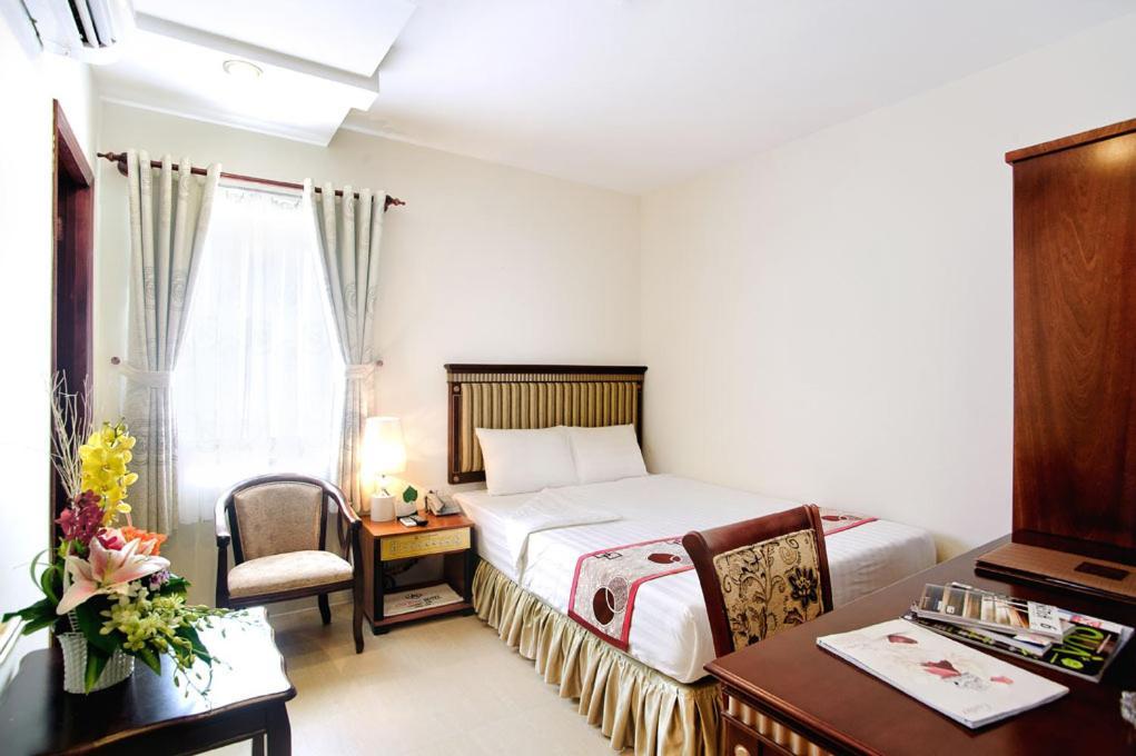 Anh Minh Hotel Hô Chi Minh-Ville Chambre photo